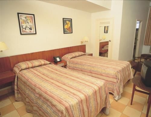 'Hotel - Colina - room' Check our website Cuba Travel Hotels .com often for updates.